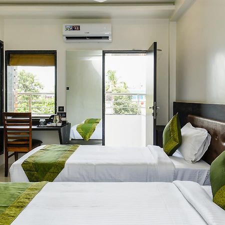 Treebo Trend Malhaar Regency Hotel Chinchvad Buitenkant foto