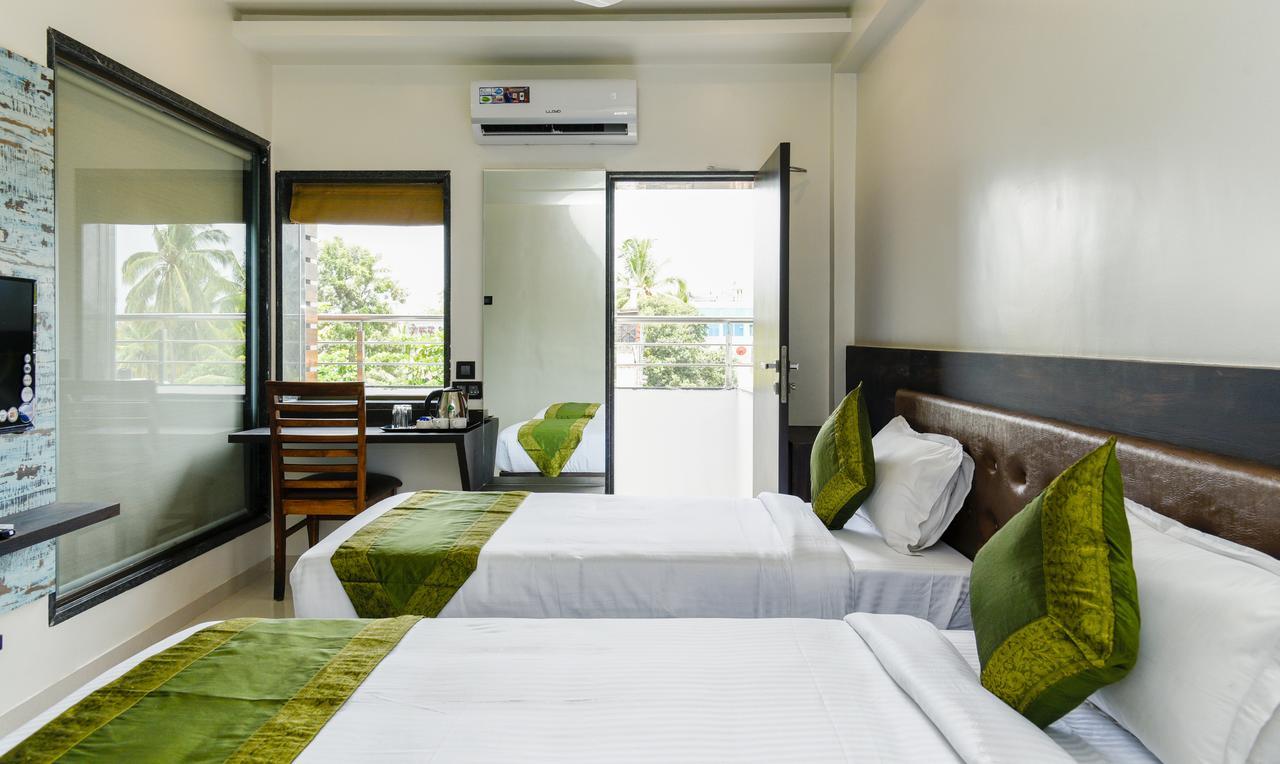 Treebo Trend Malhaar Regency Hotel Chinchvad Buitenkant foto