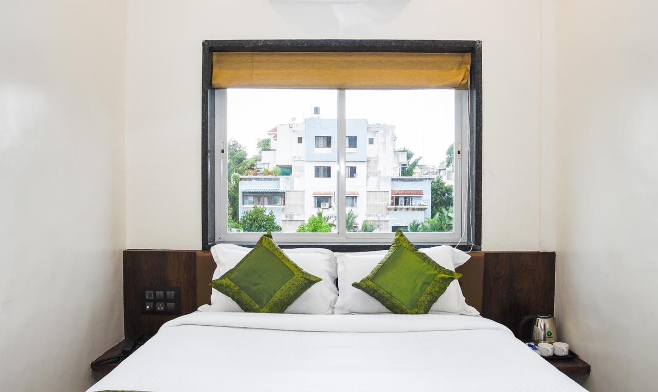 Treebo Trend Malhaar Regency Hotel Chinchvad Buitenkant foto